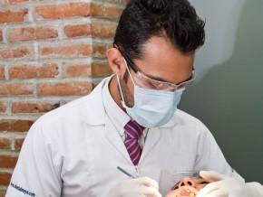 Dr. Oscar Vazquez with a Patient - Cancun Cosmetic Dentistry