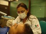 Dr. Norma Alfaro with a Patient - Cancun Cosmetic Dentistry