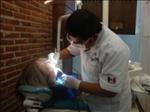 Dr. Cesar Ibanez with a Patient - Cancun Cosmetic Dentistry