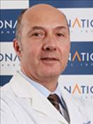 Dr. Tugrul Okay