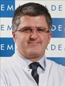 Dr. Enis Ozyar