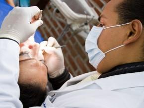 Dr. Giancarlo Medina with a Patient - Cancun Cosmetic Dentistry