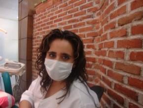 Dr. Olivia Arriaga with a Patient - Cancun Cosmetic Dentistry