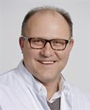Dr. Urs Breitenstein