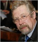 Dr. Clive Wells, MA MB FRCPath