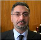 Mr. Emin Carapeti, MBBS MD FRCS (Gen)
