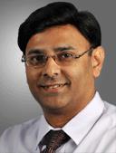 Dr. Manohar T